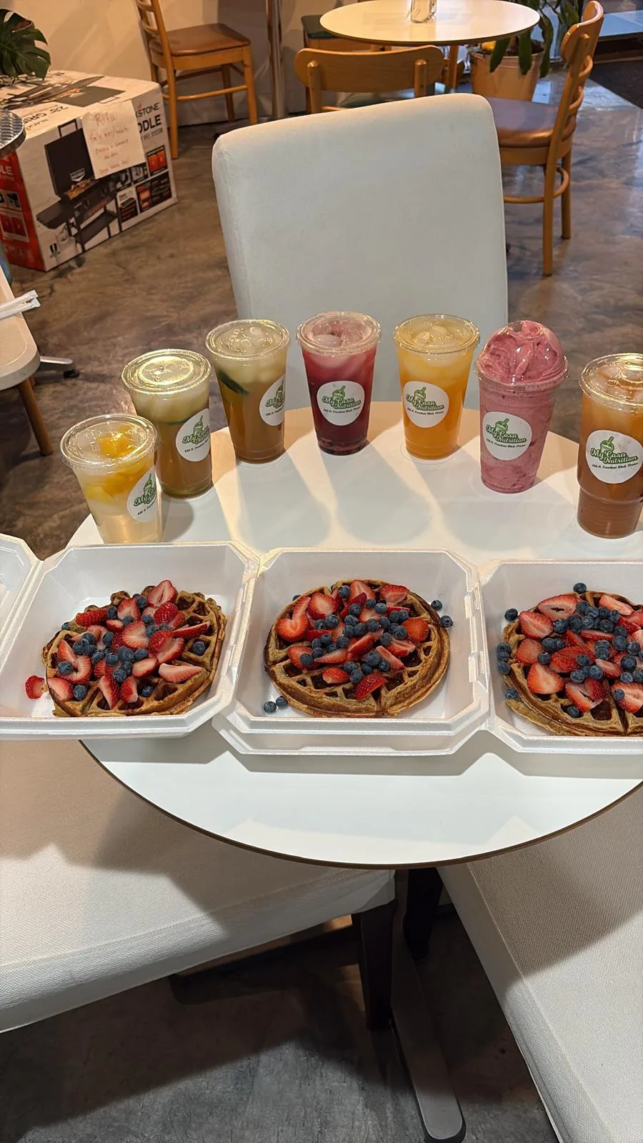 A spread of tea flavors and protein waffles at My Casa Nutrition